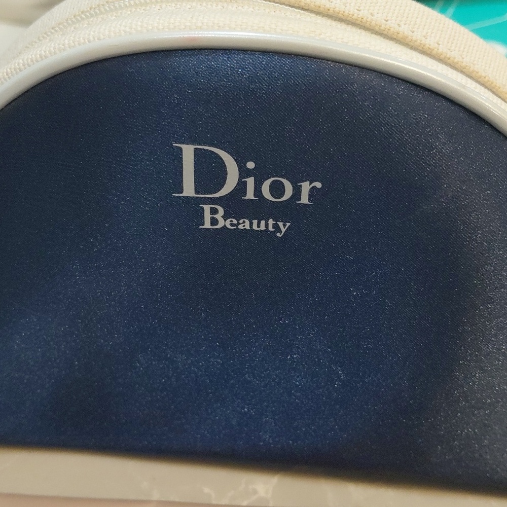 Dior Beauty Navy and Cream Cosmetic Pouch with Shiseido Eye Pads Packets